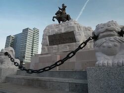 MS Monument/statue on parliament plaza with glass office building / UlaanBaatar, Mongolia, Mongolia Stock Footage
