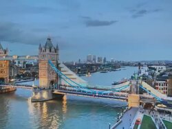 T/L Tower bridge and docklands at dusk, London, UK Stock Footage