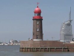 WS View of port entrance with lighthouse / Bremerhaven, Bremen, Germany Stock Footage