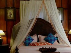 MS Bed with moscito net in tropical Bedroom  AUDIO / Luang Prabang, Luang Prabang, Laos Stock Footage