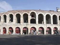 MS Tourists roaming in front of Arena di Verona at Piazza Bra / Verona, Veneto, Italy Stock Footage
