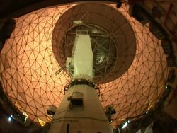 Low Angle static _ A radio telescope rotates in circles / Cambridge, Massachusetts, USA Stock Footage