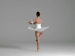 slow motion of ballerina performing Pirouette in studio Stock Footage