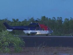 Super Puma helicopter on helipad, Western Australia Stock Footage