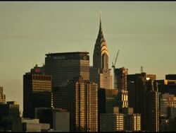 Dawn to sunrise midtown skyscrapers reflecting sun in windows timelapse Stock Footage