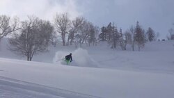Young man skier skiing in the mountains on fresh powder. Stock Footage