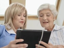 HD: Nurse And Senior Woman Singing A Song Stock Footage