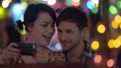 Young adult couple pose for selfies with smartphone Stock Footage