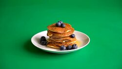 Stack of pancakes with fresh blueberry Stock Footage