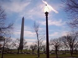 A tracking shot of the Washington Monument on a sunny day in Washington DC. Stock Footage