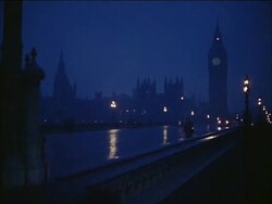 Westminster Bridge, Houses of Parliament and Big Ben at night, London, England, UK.  1963 Stock Footage