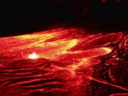 Volcanic lava Flowing at night Stock Footage