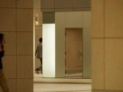 MS People walking in front of mirrors in hall / Tokyo, Japan Stock Footage