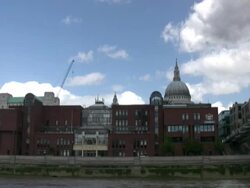 London: River Thames, Millennium Bridge, St Paul's Cathedral, from Boat Stock Footage