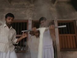 MS TD Men washing cloth in hot water / Varanasi, India Stock Footage