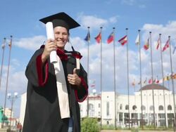 Happy university graduate with a diploma Stock Footage
