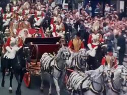 Procession through London, Wedding of HRH Prince of Wales and Diana Spencer - Charles and Diana in coach- Naval officer holds sword up, London, England. July 1981 Stock Footage