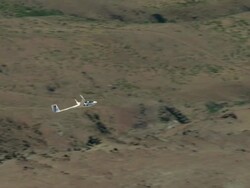 2010 AERIAL Glider flying over mountainous area / Santiago de Chile, Gran Santiago, Chile Stock Footage