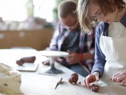 Students shaping clay in art class Stock Footage