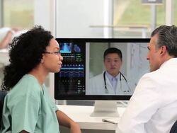 MS PAN Medical Workers Video Conferencing in Hospital Intake / Richmond, Virginia, United States Stock Footage