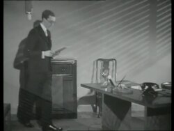 Man In office with air conditioner, UK  1939 Stock Footage