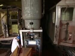 Maintenance workers wash subway trains. Stock Footage