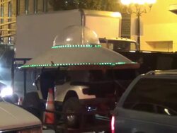 UFO golf cart on streets of San Diego Comic Con at Celebrity Sightings - Comic-Con International 2013 Celebrity Sightings - Comic-Con International 2013 on July 20, 2013 in San Diego, California (Footage by WireImage Video/Getty Images) Stock Footage