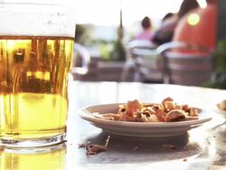 After Work beer and nuts during Happy Hour Stock Footage