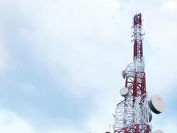 Communication tower and moving cloud in blue sky,time lapse Stock Footage