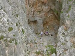 WS ZI TU AERIAL View of cliff with climber / Kalymnos, Cyclades, Greece Stock Footage