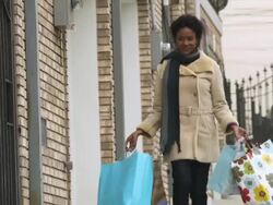 WS PAN Young women walking with shopping bags  / Newark, New Jersey, USA Stock Footage