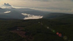 Clouds settle in a mountain valley. Stock Footage