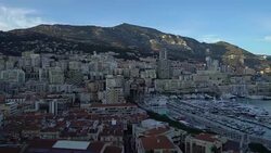 panning shot Aerial Monaco Monte Carlo harbour french riviera sunset Stock Footage