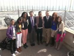 Tyrel Jackson Williams, China Anne McClain , Coco Jones, Gary Marsh, Tyler James Williams, Guest, Debby Ryan and Laura Marano at The Disney Channel And Disney XD Stars Visit The Empire State Building on 3/12/2012 Stock Footage