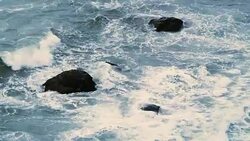 Rocks and surf real time 2 Stock Footage