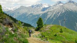Mountain Biker Riding In Alpine Landscape (UHD) Stock Footage