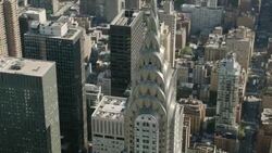 AERIAL MS TD Shot of empire state building with cars moving on road / New York City  Stock Footage