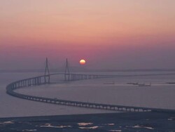 WS T/L View of Sunset scene and Nightscape of Incheon Grand Bridge (is South Korea's longest spanning cable-stayed bridge ) / Incheon, South Korea  Stock Footage