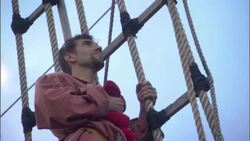 Sailors stand on a ships' rigging and look out. Stock Footage