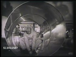 1952: PHARMACEUTICAL INDUSTRY:  VS Pharmaceutical industry workers operating machines, male cutting large cylinder metal, male w/ machine drilling, machine producing medicine bottles (for needles). Pharmacy, medical, penicillin, antibiotics Instructional Video