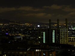 W/S Barcelona night skyline, Parallel Chimneys, Tibidabo Stock Footage