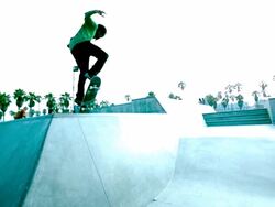 WS SLO MO Shot of Guy riding skateboard into air and lands / Venice, California, United States Stock Footage