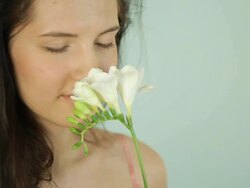 Beautiful woman with flower Stock Footage