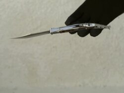 High Speed Knife in gloved hand, thrown and caught, Spain. Stock Footage