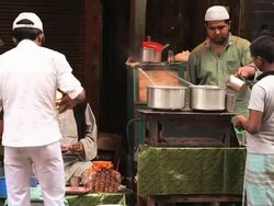 MS Man making tea at tea stall / Delhi, India   Stock Footage