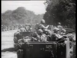 B/W 1960's soldiers with guns sitting in off-road vehicles / Vietnam / SOUND Stock Footage