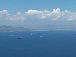 WS AERIAL View of many freighters and sailboats on ocean / Piraeus, Peloponnese, Greece Stock Footage