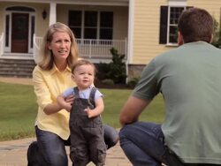 MS, Young Child Taking First Steps Between Parents, Richmond, Virginia, USA Stock Footage