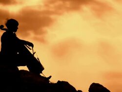 CRANE: Musician At Sunset Stock Footage