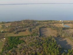 WS AERIAL View of houses and land scape in front of river / North Carolina, United States Stock Footage